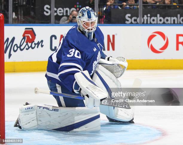 Matt Murray of the Toronto Maple Leafs watches for a rebound against the Calgary Flames during an NHL game at Scotiabank Arena on December 10, 2022...