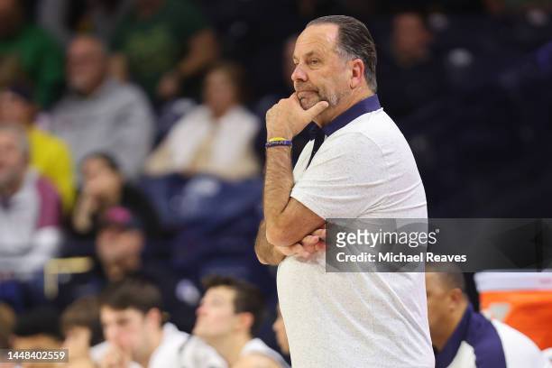 Head coach Mike Brey of the Notre Dame Fighting Irish reacts against the Marquette Golden Eagles during the second half at Purcell Pavilion at the...