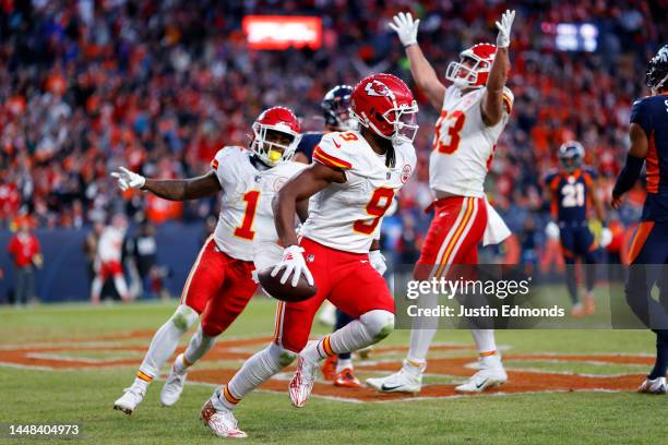 JuJu Smith-Schuster of the Kansas City Chiefs celebrates after catching a pass for a touchdown in the third quarter of a game against the Denver...