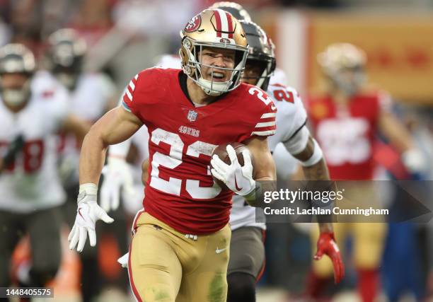 Christian McCaffrey of the San Francisco 49ers runs the ball for a touchdown during the third quarter of the game against the Tampa Bay Buccaneers at...