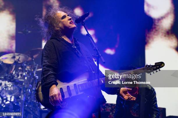 Robert Smith of The Cure performs at OVO Arena Wembley on December 11, 2022 in London, England.