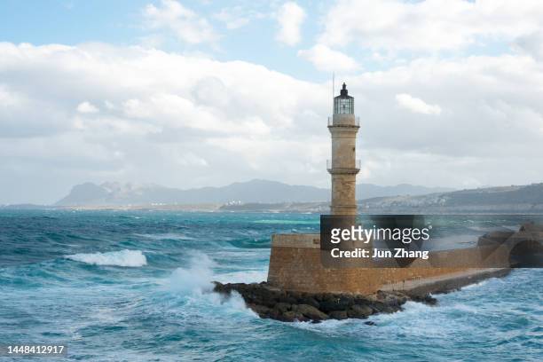 lighthouse of chania at the old venetian port , crete island, greece - crete scenics stock pictures, royalty-free photos & images