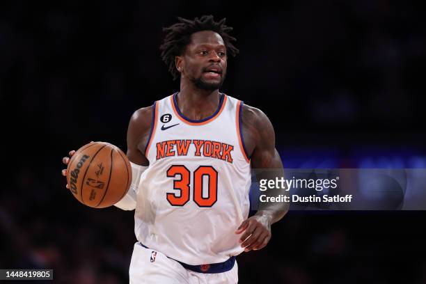 Julius Randle of the New York Knicks brings the ball up the court during the third quarter of the game against the Sacramento Kings at Madison Square...