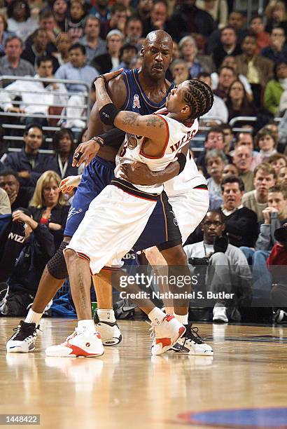 Michael Jordan of the Washington Wizards and Allen Iverson of the Philadelphia 76ers meet the at First Union Center in Philadelphia, Pennsylvania....