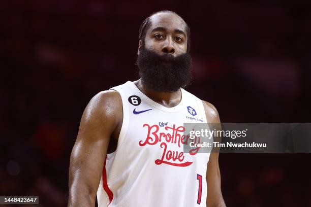 James Harden of the Philadelphia 76ers looks on during the third quarter against the Charlotte Hornets at Wells Fargo Center on December 11, 2022 in...