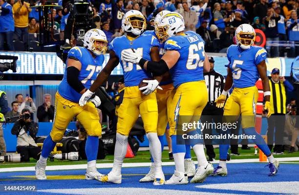 Mike Williams of the Los Angeles Chargers celebrates a touchdown in the second quarter during a game at SoFi Stadium on December 11, 2022 in...