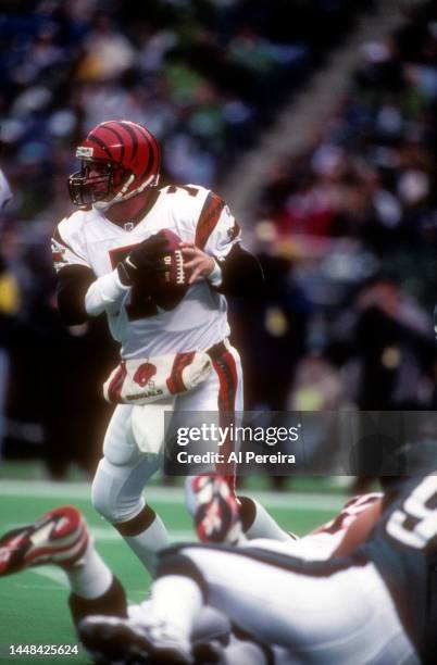 Quarterback Boomer Esiason of the Cincinnati Bengals looks to pass the ball in the game between the Cincinnati Bengals vs the Philadelphia Eagles at...