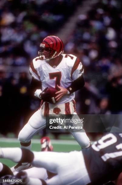 Quarterback Boomer Esiason of the Cincinnati Bengals looks to pass the ball in the game between the Cincinnati Bengals vs the Philadelphia Eagles at...