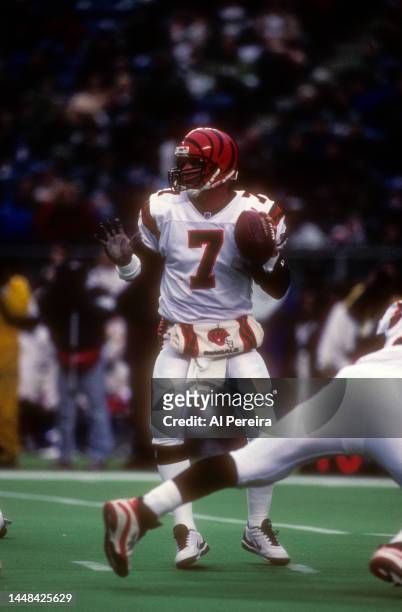 Quarterback Boomer Esiason of the Cincinnati Bengals looks to pass the ball in the game between the Cincinnati Bengals vs the Philadelphia Eagles at...