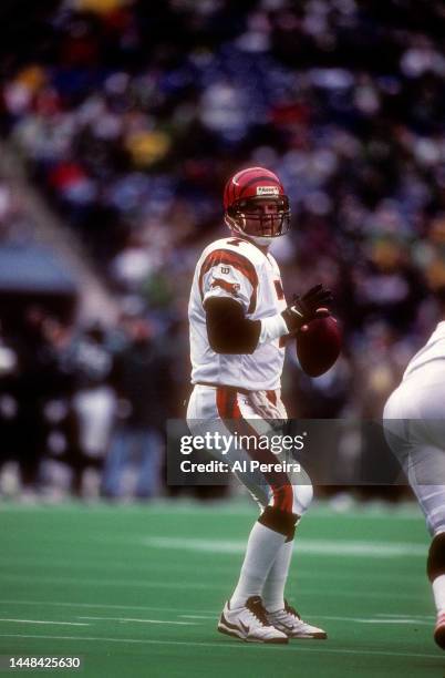 Quarterback Boomer Esiason of the Cincinnati Bengals looks to pass the ball in the game between the Cincinnati Bengals vs the Philadelphia Eagles at...