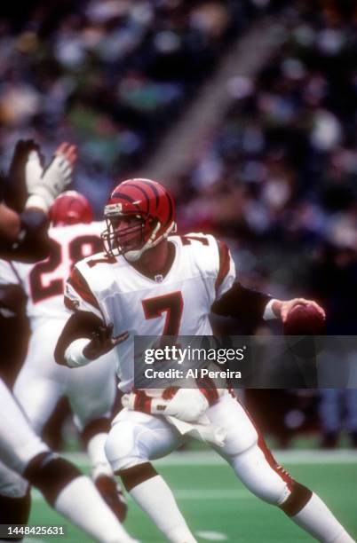 Quarterback Boomer Esiason of the Cincinnati Bengals looks to pass the ball in the game between the Cincinnati Bengals vs the Philadelphia Eagles at...