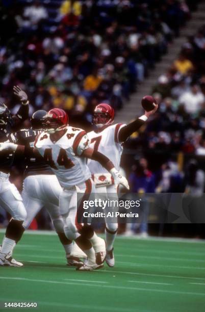 Quarterback Boomer Esiason of the Cincinnati Bengals passes the ball in the game between the Cincinnati Bengals vs the Philadelphia Eagles at...