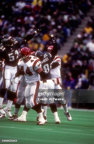 Quarterback Boomer Esiason of the Cincinnati Bengals passes the ball in the game between the Cincinnati Bengals vs the Philadelphia Eagles at...