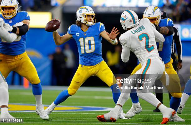 Justin Herbert of the Los Angeles Chargers passes during a game against the Miami Dolphins at SoFi Stadium on December 11, 2022 in Inglewood,...