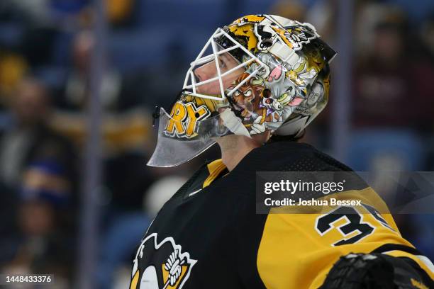 Tristan Jarry of the Pittsburgh Penguins looks on during the second period of an NHL hockey game against the Buffalo Sabres at KeyBank Center on...