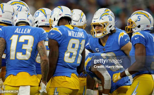 Justin Herbert of the Los Angeles Chargers calls a play during a game against the Miami Dolphins at SoFi Stadium on December 11, 2022 in Inglewood,...