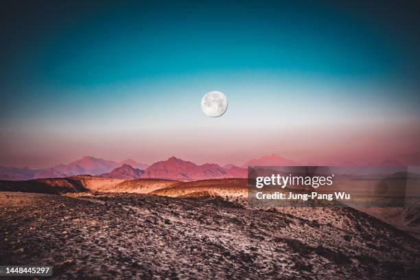 moon over hurghada desert on sunrise - sahara　sunrise stock pictures, royalty-free photos & images