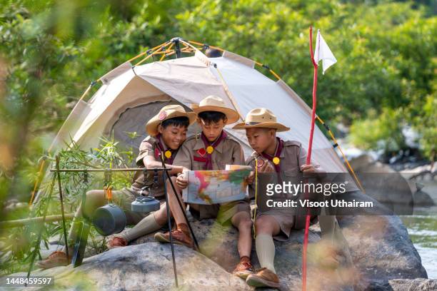 group of boy scout in uniform,adventure and camping activity in nature. - international day eight imagens e fotografias de stock