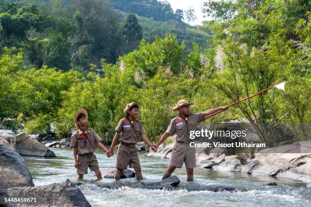 boy scout in camp. - boy scouts of america stock pictures, royalty-free photos & images