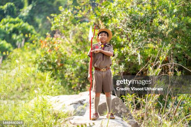 boy scout. - boy scouts of america stock pictures, royalty-free photos & images