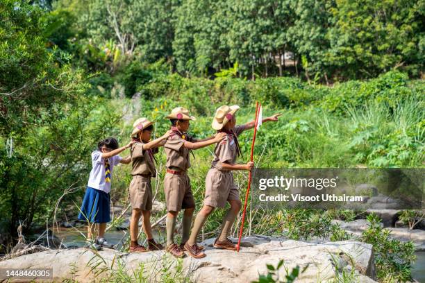 children scouts boys having fun during adventure travel and camping activity. - girl guide association stock pictures, royalty-free photos & images