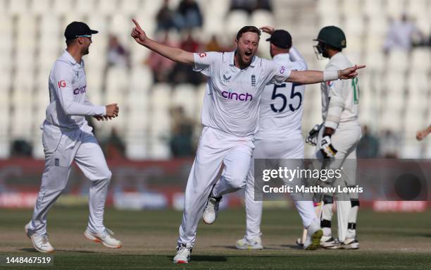 Ollie Robinson of England celebrates taking the final wicket of Mohammad Ali of Pakistan to win the Second Test Match between Pakistan and England at...