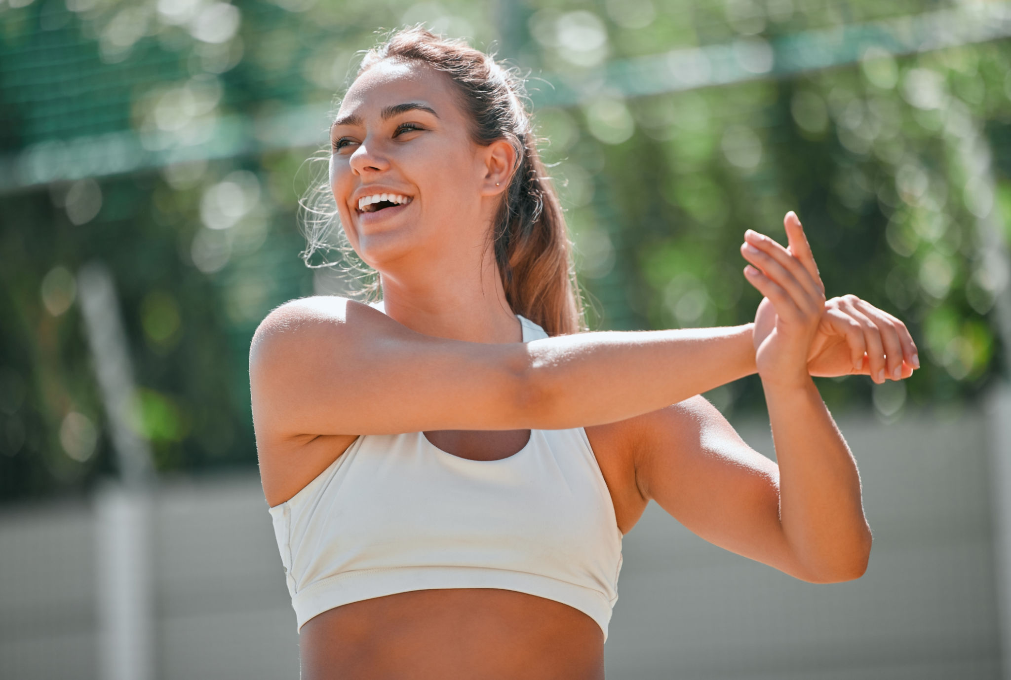 woman stretching outdoors