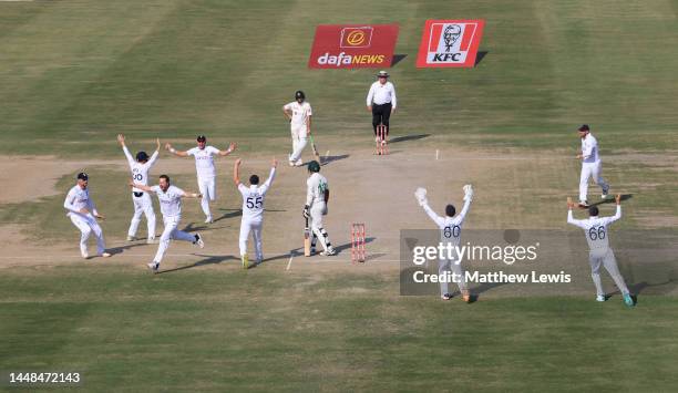 Ollie Robinson of England celebrates taking the final wicket of Mohammad Ali of Pakistan to win the Second Test Match between Pakistan and England at...