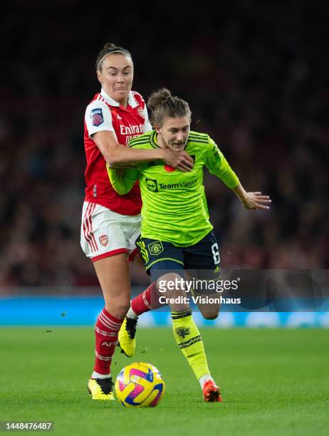 Hannah Blundell of Manchester United Women battles with Caitlin Foord of Arsenal Women during the FA Women's Super League match between Arsenal and...
