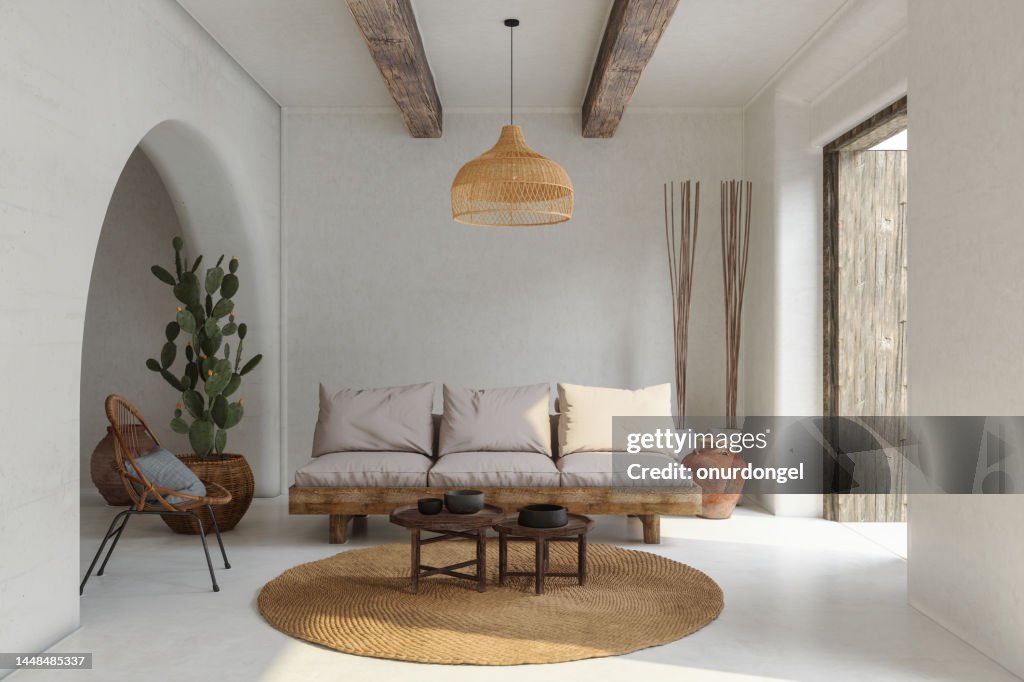 Wohnzimmer Interieur mit Sofa, Korbsessel, Kaktuspflanze und Couchtisch