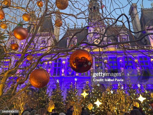 christmas at town hall in paris, france - snow festival stock-fotos und bilder