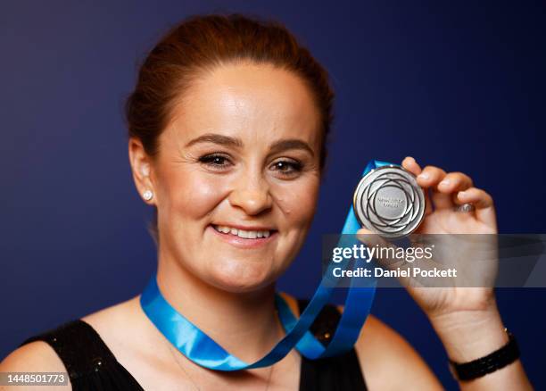 Ashleigh Barty poses with the Newcombe Medal during the 2022 Newcombe Medal at Crown Entertainment Complex on December 12, 2022 in Melbourne,...