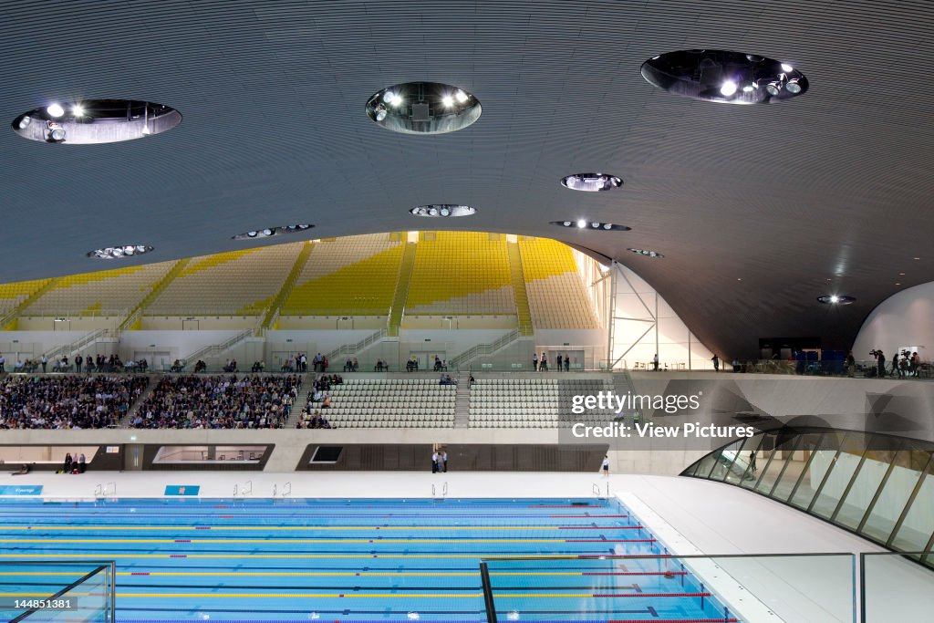 London Aquatic CentreLondon, E9, United Kingdom Architect:  Zaha Hadid Architects 2011 London Aquatic Centre, Zaha Hadid Architects, London, Uk, 2011, View Of Swimming Pool With People