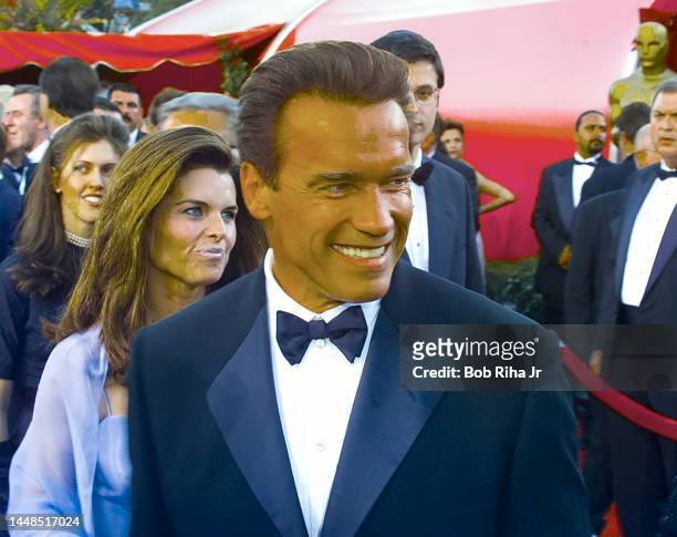 Arnold Schwarzenegger & wife Maria Shriver arrive to Academy Awards, March 23, 1998 in Los Angeles, California.