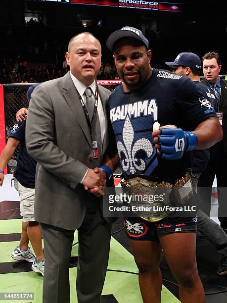 Strikeforce CEO Scott Coker with Strikeforce Heavyweight Grand Prix Winner Daniel Cormier during the Strikeforce event at HP Pavilion on May 19, 2012...