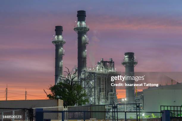 gas turbine electrical power plant with in twilight power for factory energy concept. - gas turbine electrical power plant stock pictures, royalty-free photos & images