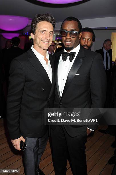 Producer Lawrence Bender and Sean Combs attends the Vanity Fair And Gucci Party during the 65th Annual Cannes Film Festival at Hotel Du Cap on May...