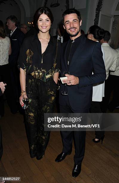 Gemma Arterton and Stefano Catelli attend the Vanity Fair And Gucci Party during the 65th Annual Cannes Film Festival at Hotel Du Cap on May 19, 2012...