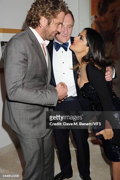 Actress Salma Hayek, Francois-Henri Pinault and Gerard Butler attend the Vanity Fair And Gucci Party during the 65th Annual Cannes Film Festival at...
