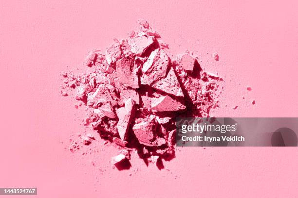 cosmetic make-up  product for a woman  - eyeshadow in powder in  viva magenta  color of the year 2023 on pink color background. - eye shadow imagens e fotografias de stock