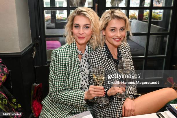 Julia Meise and Nina Meise attend the Christmas Charity Lunch at Käfer Wiesn-Schänke on December 12, 2022 in Munich, Germany.