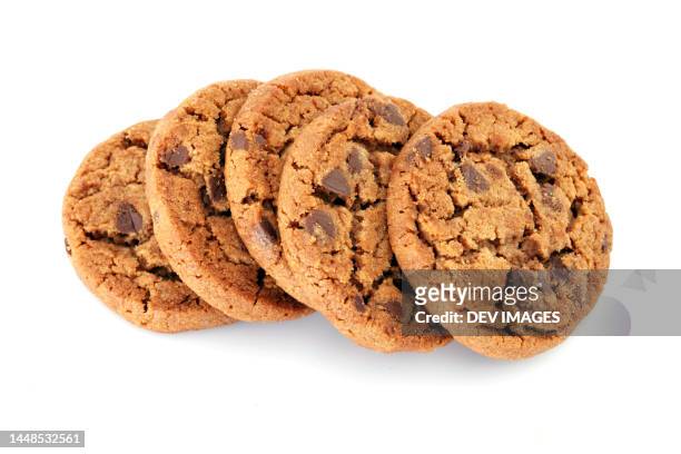 closeup of chocolate chip cookies isolated on white - chocolate chip cookies stock-fotos und bilder