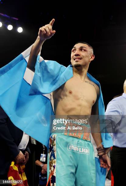 Teofimo Lopez celebrates his split decision win against Sandor Martin during their junior welterweight bout at Madison Square Garden on December 10,...