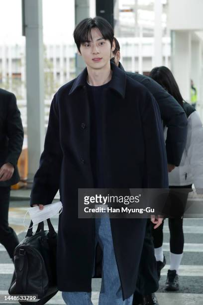Hwang Min-Hyun of boy band NU'EST and Wanna One is seen on departure at Incheon International Airport on December 12, 2022 in Incheon, South Korea.