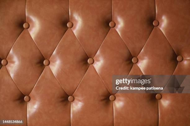 full frame shot of orange leather sofa - skin diamond stock pictures, royalty-free photos & images