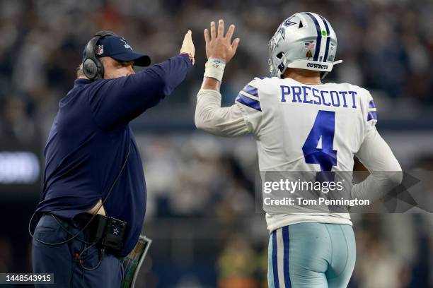 Head coach Mike McCarthy of the Dallas Cowboys celebrates with quarterback Dak Prescott of the Dallas Cowboys after the Cowboys scored a touchdown...