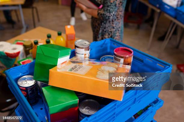 donated food for the community - foodbanks for the needy stock pictures, royalty-free photos & images