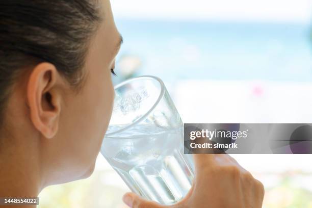 drinking water - iced drink stock pictures, royalty-free photos & images