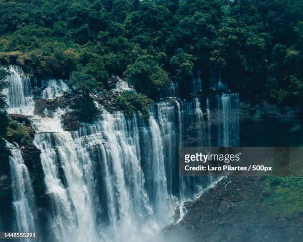 scenic view of waterfall in forest,calandula,angola - angola water stock pictures, royalty-free photos & images