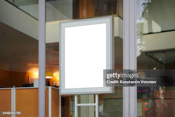 blank banner on window office template. promotional banner on the store window mock up. - shop window sign stock pictures, royalty-free photos & images